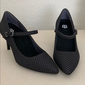 Black patterned mary jane pumps